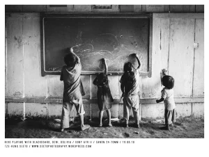 Bolivia Oromomo Kids playing with blackboard