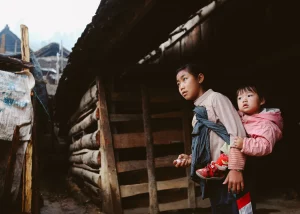 China Man Noi Child looking after sister