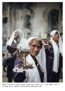 Peru, Lima, Old lady with smoke at parade