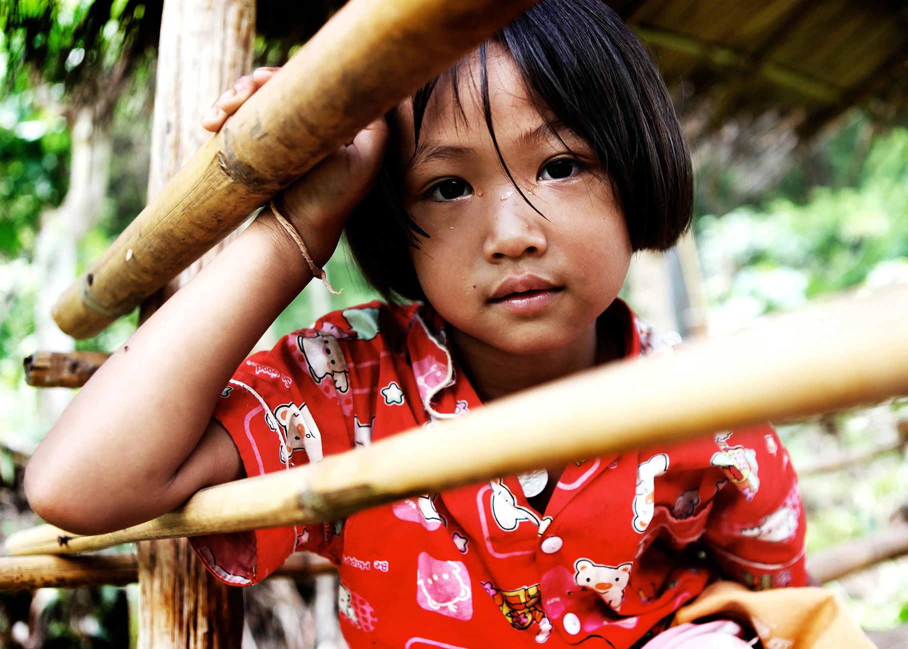 Thailand, Mae Hong Son, Girl in Bamboo Shelter.jpg