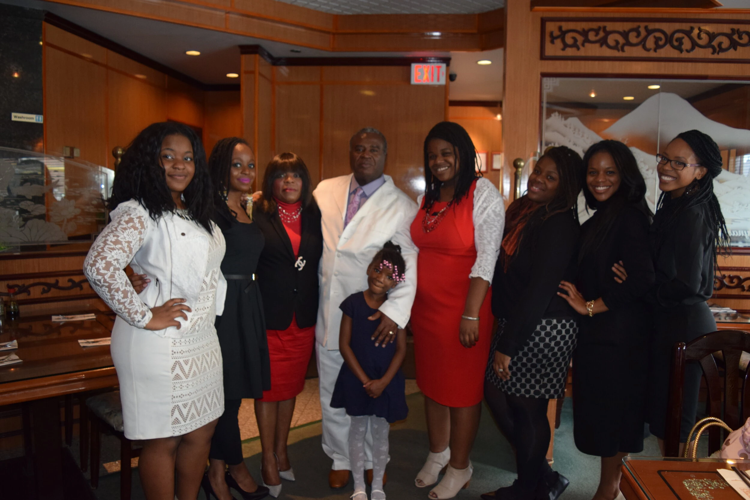 Kelly (second from left) with her parents, sisters and niece